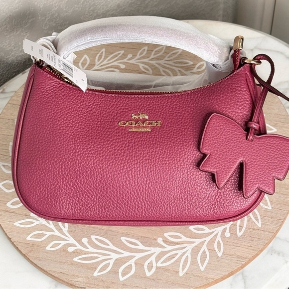 Coach Handbags - NWT,Coach Bow Charm & LOGO Teri Shoulder Bag
Crossbody, Gold Pin mount Logo❤️